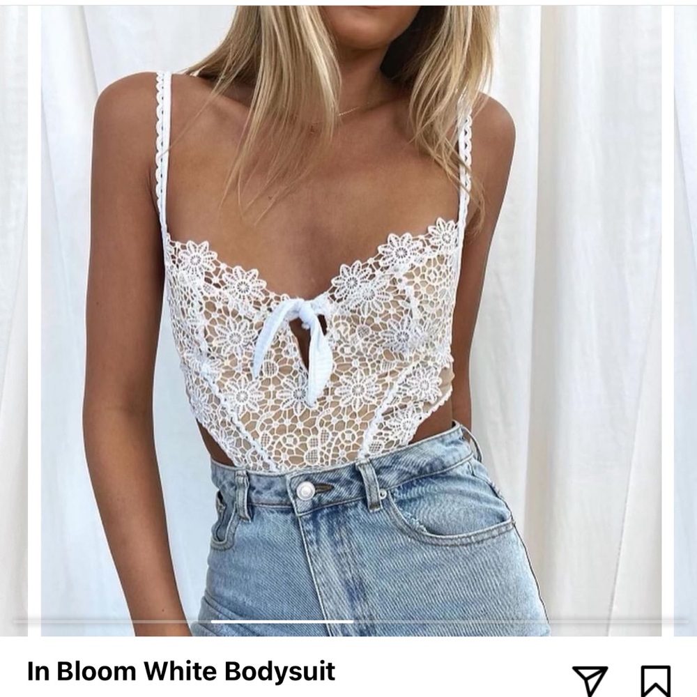 Isabelle’s cabinet white body suit